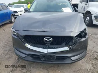 2017 Mazda CX-5 Touring z VIN JM3KFBCL4H0178747, wystawiony jako IAAI lot #42041380 z przebiegiem 112 083 mil mil oraz . Historia ofert i sprzedaży dostępna na DreamBid. Obrazek 12.