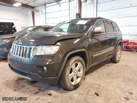 2011 Jeep Grand Cherokee Limited with VIN 1J4RR5GG3BC651065, listed as a IAAI auction lot 41020593 with 154,825 mi miles. Bid and sale history available at carsss.com. Image 20.