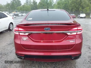 2018 Ford Fusion Titanium with VIN 3FA6P0D91JR233679, listed as a IAAI auction lot 42182140 with 100,706 mi miles and . Bid and sale history available at DreamBid. Image 16.