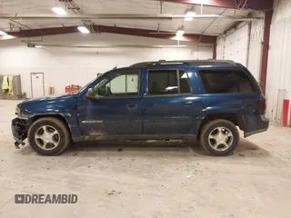 2004 Chevrolet TrailBlazer EXT LT with VIN 1GNET16P046158436, listed as a IAAI auction lot 41707323 with 163,328 mi miles. Bid and sale history available at carsss.com. Image 14.
