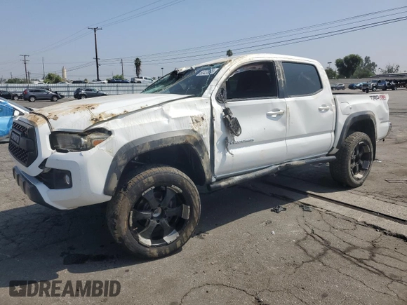 2017 Toyota Tacoma SR5 with VIN 3TMCZ5AN7HM065026, listed as a Copart auction lot 60438365 with 122,329 mi miles and Salvage title. Bid and sale history available at DreamBid. Image 1.