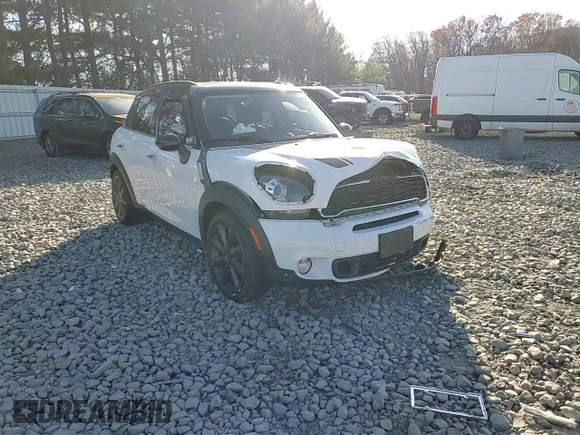 2012 MINI Countryman S with VIN WMWZC3C57CWM27732, listed as a Copart auction lot 80361854 with 120,735 mi miles and Salvage title. Bid and sale history available at DreamBid. Image 11.