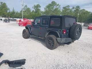 2007 Jeep Wrangler Unlimited Sahara with VIN 1J4GB59167L221686, listed as a IAAI auction lot 42473996 with 151,065 mi miles and . Bid and sale history available at DreamBid. Image 3.