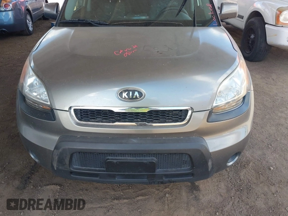 2010 Kia Soul + with VIN KNDJT2A28A7163141, listed as a IAAI auction lot 42035132 with 211,661 mi miles. Bid and sale history available at carsss.com. Image 6.