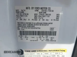 2014 Ford F-150 XL with VIN 1FTFW1EFXEKE92754, listed as a IAAI auction lot 42109551 with 219,130 mi miles. Bid and sale history available at carsss.com. Image 9.
