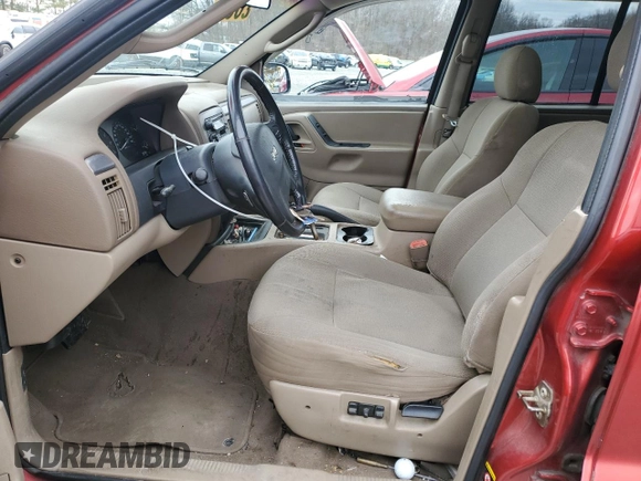 2002 Jeep Grand Cherokee with VIN 1J8GX38S92C176329, listed as a Copart auction lot 47885635 with 154,167 mi miles and Salvage title. Bid and sale history available at DreamBid. Image 7.