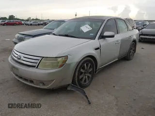 2008 Ford Taurus SEL z VIN 1FAHP24W78G174813, wystawiony jako IAAI lot #42482599 z przebiegiem 154 115 mil mil oraz . Historia ofert i sprzedaży dostępna na DreamBid. Obrazek 2.
