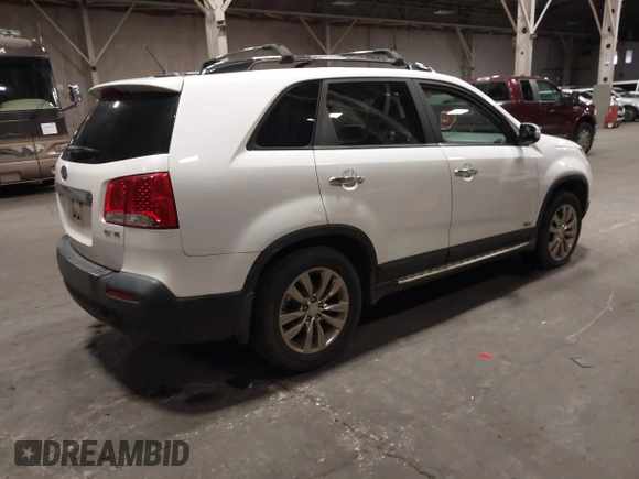 2011 Kia Sorento EX with VIN 5XYKUDA2XBG136475, listed as a IAAI auction lot 41795452 with 218,041 mi miles. Bid and sale history available at carsss.com. Image 4.