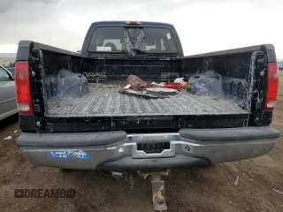 2000 Ford Super Duty F-250 XL with VIN 1FTNW21F6YEC98099, listed as a Copart auction lot 45403345 with 121,425 mi miles and Salvage Title. Bid and sale history available at carsss.com. Image 6.