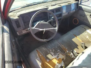 1987 Nissan Hardbody E z VIN JN6ND11S3HW006235, wystawiony jako Copart lot #78528914 z przebiegiem 298 079 mil mil oraz Szkody całkowita. Historia ofert i sprzedaży dostępna na DreamBid. Obrazek 8.
