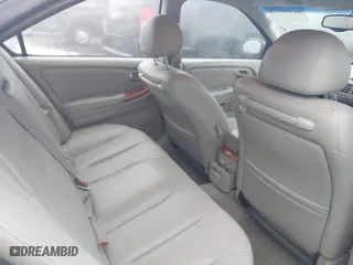 2002 Infiniti I35 Luxury with VIN JNKDA31A32T018726, listed as a IAAI auction lot 41784774 with 139,008 mi miles. Bid and sale history available at carsss.com. Image 8.