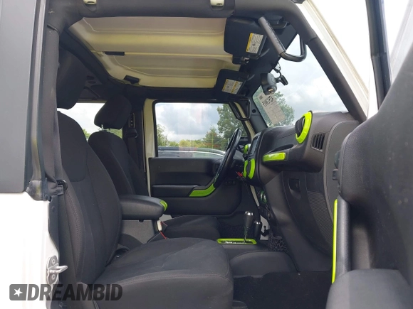 2016 Jeep Wrangler Black Bear with VIN 1C4AJWAG7GL106809, listed as a IAAI auction lot 42513015 with 86,730 mi miles and . Bid and sale history available at DreamBid. Image 5.