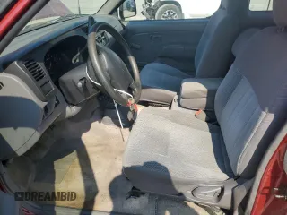 2000 Nissan Frontier XE with VIN 1N6DD26SXYC393054, listed as a Copart auction lot 62410125 with 106,319 mi miles and Salvage title. Bid and sale history available at DreamBid. Image 7.