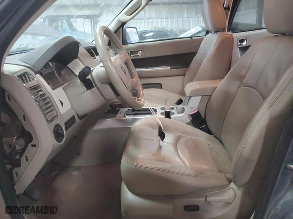 2010 Mercury Mariner Premier with VIN 4M2CN9HG4AKJ19027, listed as a Copart auction lot 72170534 with 136,170 mi miles and Salvage Title. Bid and sale history available at carsss.com. Image 7.