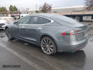 2013 Tesla Model S with VIN 5YJSA1CG5DFP06411, listed as a IAAI auction lot 41079914 with 266,968 mi miles. Bid and sale history available at carsss.com. Image 3.