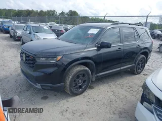 2025 Honda Pilot TrailSport with VIN 5FNYG1H61SB026477, listed as a IAAI auction lot 41471719 with 12,624 mi miles and . Bid and sale history available at DreamBid. Image 2.