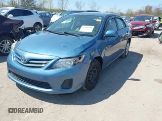 2013 Toyota Corolla L with VIN 5YFBU4EE5DP148083, listed as a IAAI auction lot 42105492 with 73,274 mi miles and . Bid and sale history available at carsss.com. Image 2.