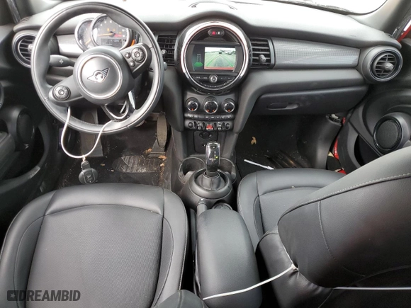 2021 MINI Hardtop 4 Door Oxford Edition with VIN WMWXU7C08M2N49721, listed as a Copart auction lot 77983324 with 64,096 mi miles and Salvage Title. Bid and sale history available at carsss.com. Image 8.