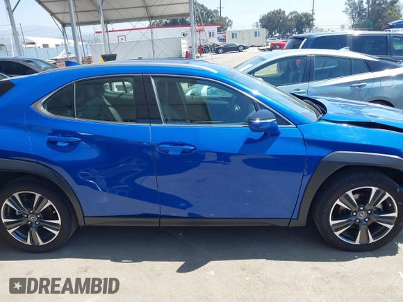 2022 Lexus UX with VIN JTHX3JBH0N2049742, listed as a IAAI auction lot 41917341 with 18,728 mi miles. Bid and sale history available at carsss.com. Image 13.