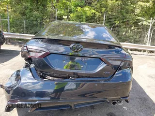 2022 Toyota Camry TRD with VIN 4T1KZ1AK2NU064511, listed as a IAAI auction lot 42176608 with 28,064 mi miles and . Bid and sale history available at DreamBid. Image 16.
