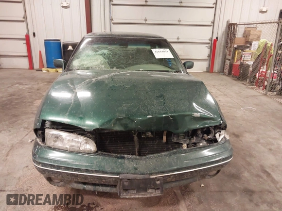 1997 Pontiac Bonneville SE z VIN 1G2HX52KXVH250272, wystawiony jako IAAI lot #41644041 z przebiegiem 160 791 mil mil oraz . Historia ofert i sprzedaży dostępna na DreamBid. Obrazek 6.