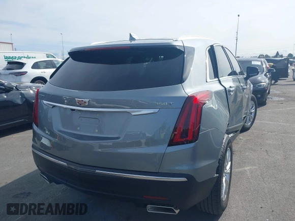 2023 Cadillac XT5 FWD Luxury z VIN 1GYKNAR49PZ137556, wystawiony jako IAAI lot #41934199 z przebiegiem 13 298 mil mil oraz . Historia ofert i sprzedaży dostępna na DreamBid. Obrazek 4.