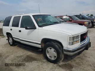 1998 GMC Yukon with VIN 1GKEK13R9WJ711087, listed as a Copart auction lot 73795594 with 177,708 mi miles and Non Repairable. Bid and sale history available at carsss.com. Image 4.