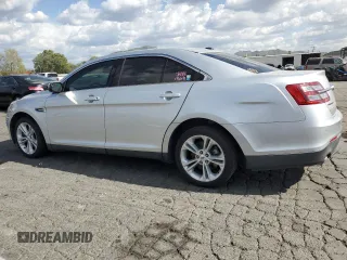 2015 Ford Taurus SEL with VIN 1FAHP2E88FG121647, listed as a Copart auction lot 51660585 with 155,686 mi miles and Clean Title. Bid and sale history available at DreamBid. Image 2.