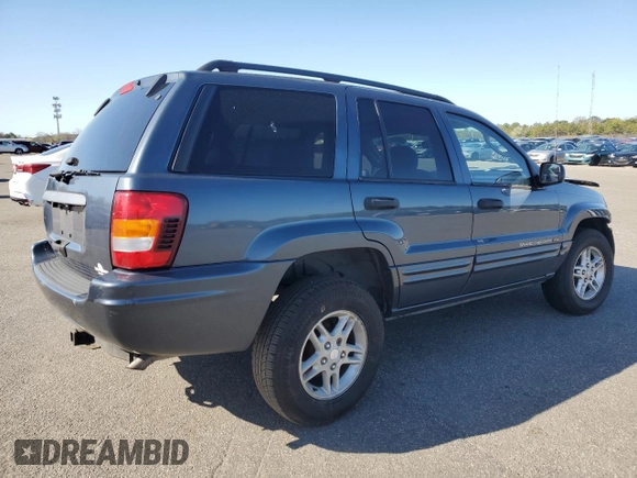 2004 Jeep Grand Cherokee Laredo z VIN 1J4GW48S74C159381, wystawiony jako Copart lot #53972115 z przebiegiem 128 309 mil mil oraz Szkoda całkowita • Salvage title. Historia ofert i sprzedaży dostępna na DreamBid. Obrazek 3.