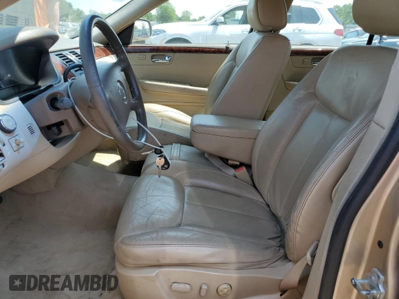 2006 Cadillac DTS 1SC z VIN 1G6KD57Y26U175599, wystawiony jako Copart lot #59149155 z przebiegiem 172 952 mil mil oraz Czysty tytuł • Clean title. Historia ofert i sprzedaży dostępna na DreamBid. Obrazek 7.