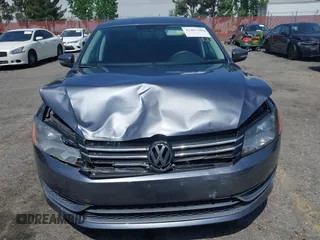 2014 Volkswagen Passat S with VIN 1VWAP7A3XEC003928, listed as a IAAI auction lot 42483100 with 132,117 mi miles and . Bid and sale history available at DreamBid. Image 6.