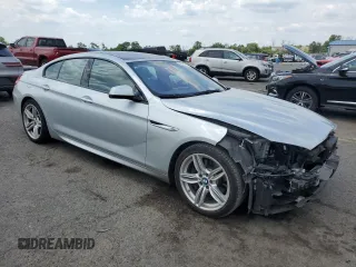2015 BMW 6 Series 640i xDrive z VIN WBA6B8C53FD453229, wystawiony jako Copart lot #60371214 z przebiegiem 116 624 mil mil oraz Szkoda całkowita • Salvage title. Historia ofert i sprzedaży dostępna na DreamBid. Obrazek 4.