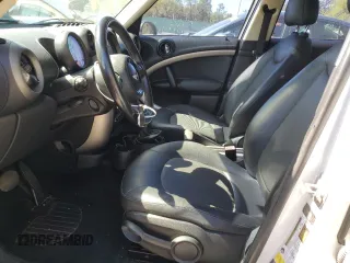 2011 MINI Countryman with VIN WMWZB3C56BWM00040, listed as a Copart auction lot 48660435 with 146,607 mi miles and Salvage title. Bid and sale history available at DreamBid. Image 7.