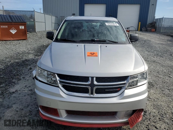 2013 Dodge Journey American Value z VIN 3C4PDCABXDT621551, wystawiony jako Copart lot #52523675 z przebiegiem 123 348 mil mil oraz Szkoda całkowita • Salvage title. Historia ofert i sprzedaży dostępna na DreamBid. Obrazek 5.