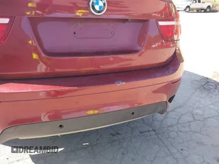 2014 BMW X6 xDrive35i z VIN 5UXFG2C57E0C44052, wystawiony jako IAAI lot #40231766 z przebiegiem 131 573 mil mil oraz . Historia ofert i sprzedaży dostępna na DreamBid. Obrazek 19.