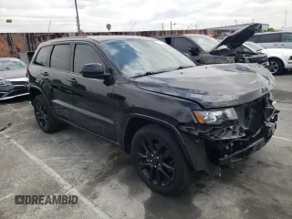2019 Jeep Grand Cherokee Altitude with VIN 1C4RJEAG3KC530610, listed as a Copart auction lot 55153155 with 70,225 mi miles and Salvage title. Bid and sale history available at DreamBid. Image 4.