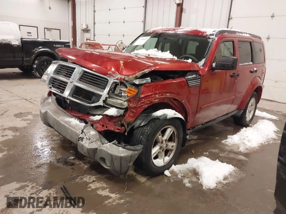 2009 Dodge Nitro SE with VIN 1D8GU28K79W522396, listed as a IAAI auction lot 41399429 with 148,727 mi miles and . Bid and sale history available at DreamBid. Image 17.