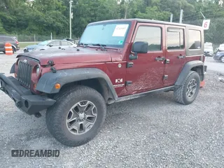 2008 Jeep Wrangler Unlimited X z VIN 1J4GA39128L568988, wystawiony jako IAAI lot #42445403 z przebiegiem 198 032 mil mil oraz . Historia ofert i sprzedaży dostępna na DreamBid. Obrazek 18.