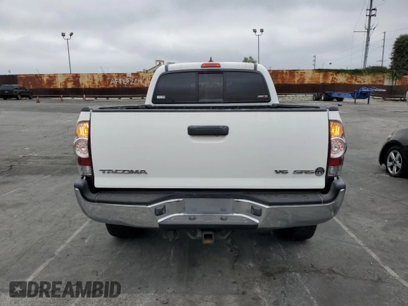 2014 Toyota Tacoma PreRunner with VIN 3TMKU4HN9EM040957, listed as a Copart auction lot 76579404 with 91,222 mi miles and Salvage title. Bid and sale history available at DreamBid. Image 6.