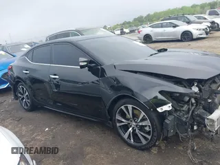 2018 Nissan Maxima SV z VIN 1N4AA6AP9JC369624, wystawiony jako IAAI lot #41902943 z przebiegiem 121 615 mil mil oraz . Historia ofert i sprzedaży dostępna na DreamBid. Obrazek 13.