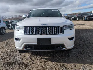 2017 Jeep Grand Cherokee Overland with VIN 1C4RJFCG7HC707767, listed as a Copart auction lot 82345154 with 96,374 mi miles and Salvage Title. Bid and sale history available at carsss.com. Image 5.