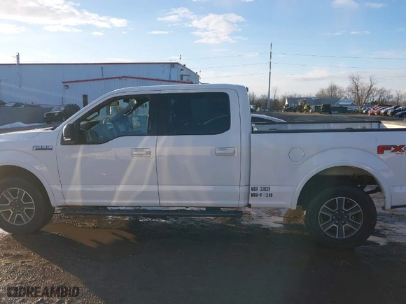 2015 Ford F-150 XLT w/HD Payload Pkg with VIN 1FTFW1EF6FFC66723, listed as a IAAI auction lot 41303476 with 203,999 mi miles. Bid and sale history available at carsss.com. Image 14.