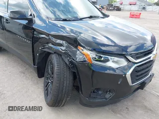 2020 Chevrolet Traverse LS with VIN 1GNERFKW3LJ180984, listed as a IAAI auction lot 42241631 with 69,654 mi miles and . Bid and sale history available at DreamBid. Image 6.