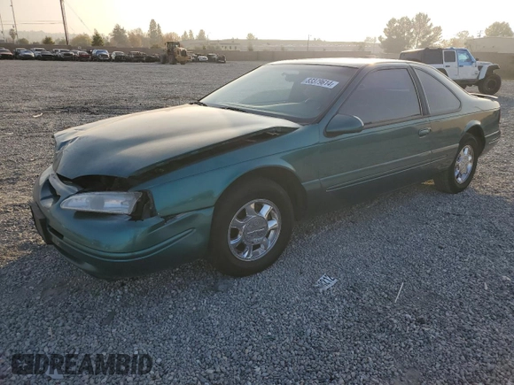 1997 Ford Thunderbird LX z VIN 1FALP62W4VH170423, wystawiony jako Copart lot #83379614 z przebiegiem 93 117 mil mil oraz Szkody całkowita. Historia ofert i sprzedaży dostępna na DreamBid. Obrazek 1.