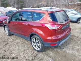 2016 Ford Escape Titanium with VIN 1FMCU9J9XGUC71696, listed as a IAAI auction lot 41651168 with 108,856 mi miles. Bid and sale history available at carsss.com. Image 3.