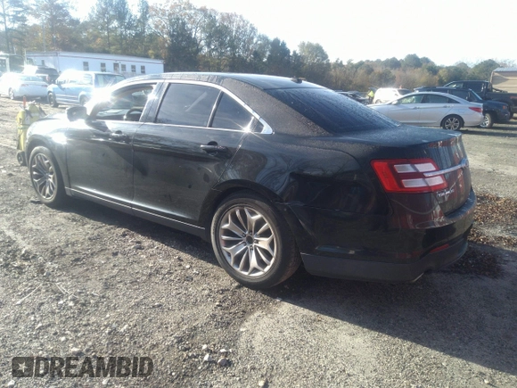 2014 Ford Taurus Limited with VIN 1FAHP2F80EG101504, listed as a IAAI auction lot 40974783 with 177,522 mi miles. Bid and sale history available at carsss.com. Image 3.