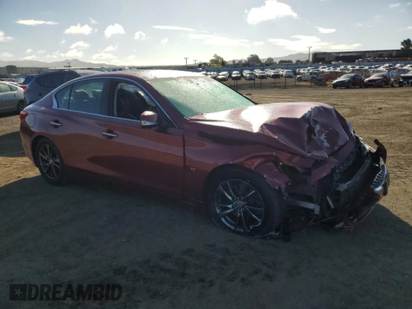 2015 Infiniti Q50 Premium with VIN JN1BV7AP7FM355136, listed as a Copart auction lot 56586325 with 101,384 mi miles and Salvage title. Bid and sale history available at DreamBid. Image 4.