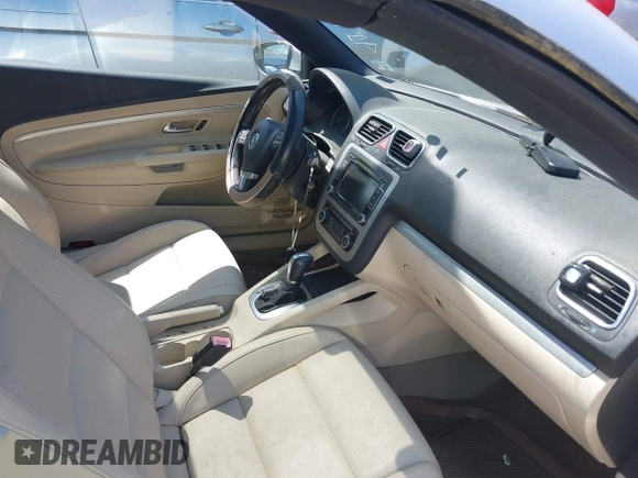 2012 Volkswagen Eos Komfort with VIN WVWBW7AH8CV001621, listed as a IAAI auction lot 41988717 with 146,882 mi miles and . Bid and sale history available at DreamBid. Image 5.