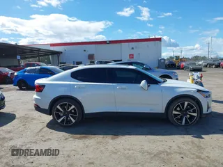 2022 Polestar 2 z VIN LPSED3KA8NL079546, wystawiony jako IAAI lot #41743211 z przebiegiem 26 509 mil mil oraz . Historia ofert i sprzedaży dostępna na DreamBid. Obrazek 13.