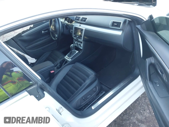 2014 Volkswagen CC R-Line with VIN WVWBP7AN0EE521995, listed as a IAAI auction lot 41213732 with 113,421 mi miles. Bid and sale history available at carsss.com. Image 5.